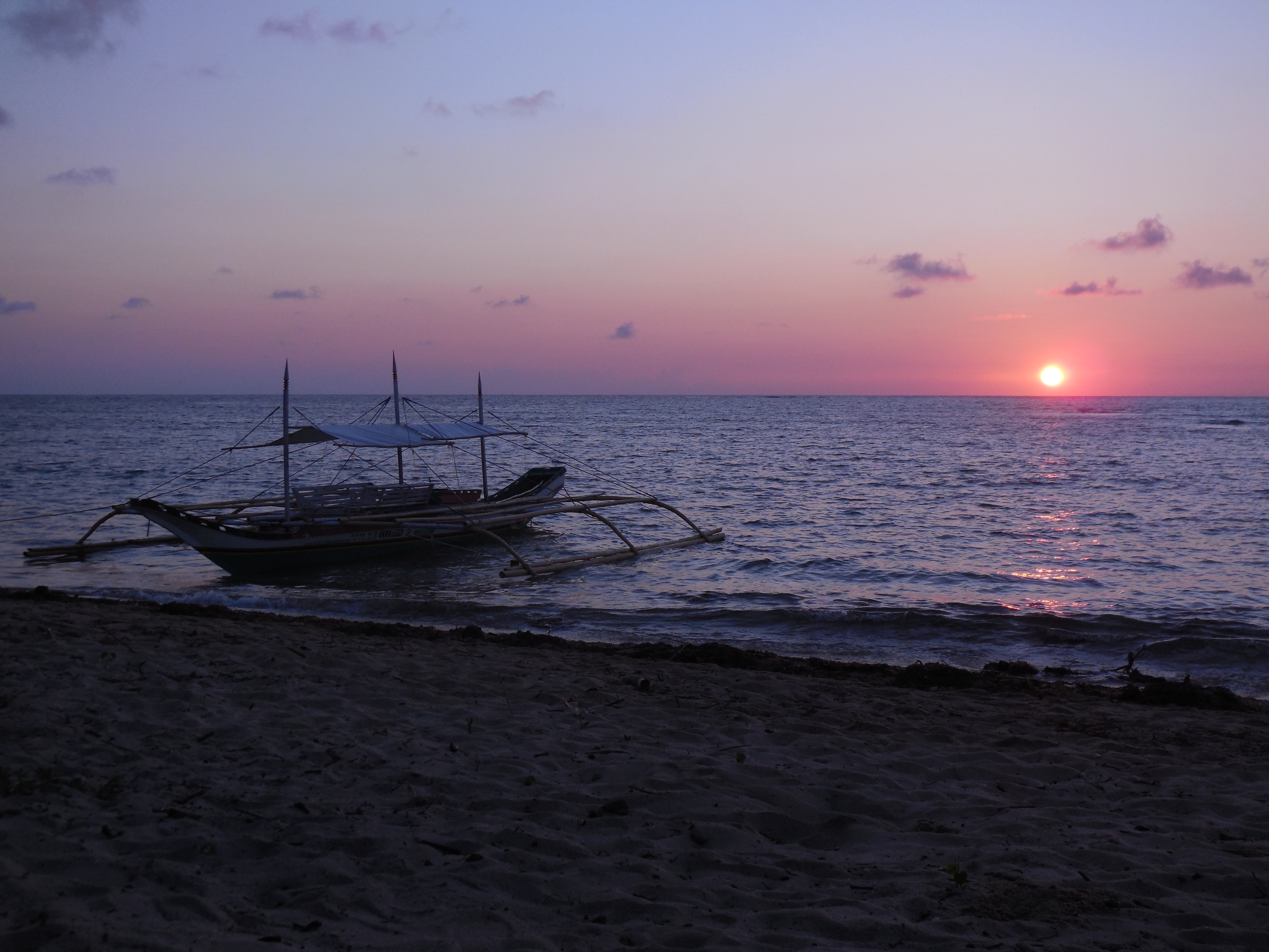 Sunrise over Cagbalete Island from the beach camping side of Mauban
