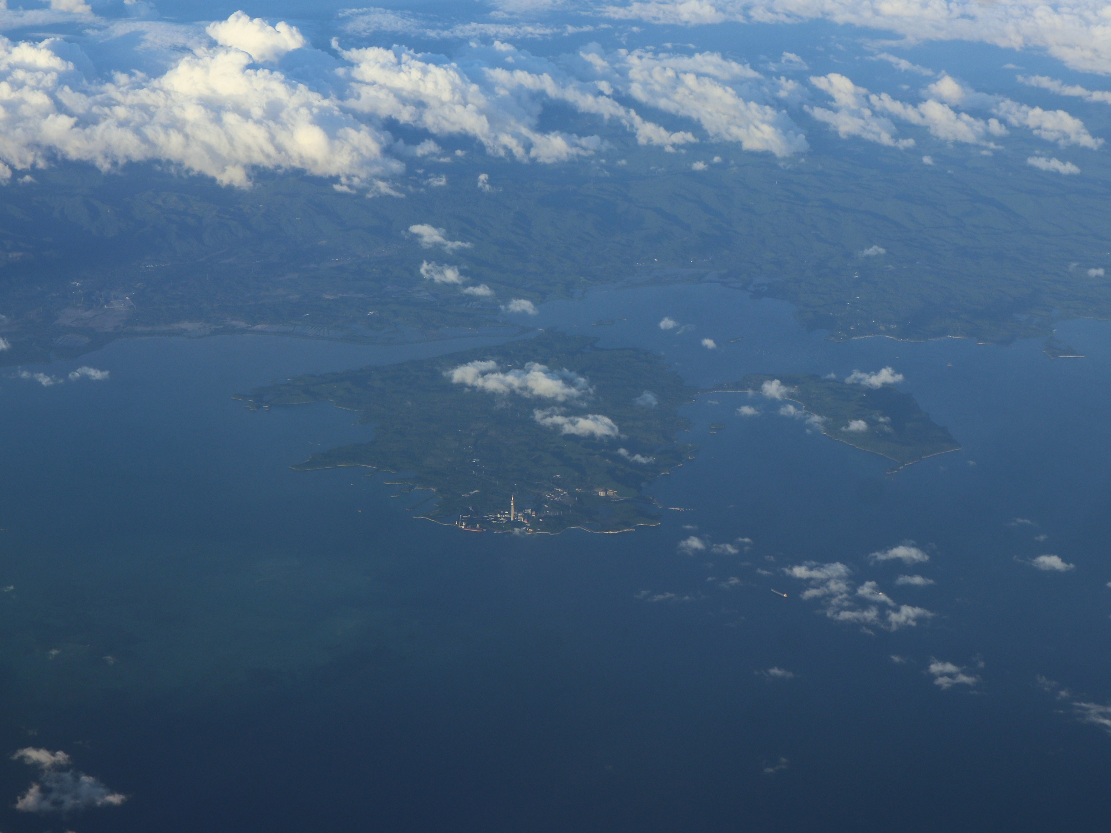 Quezon island coastline near the boat-access camping routes to Dampalitan Island Campsite