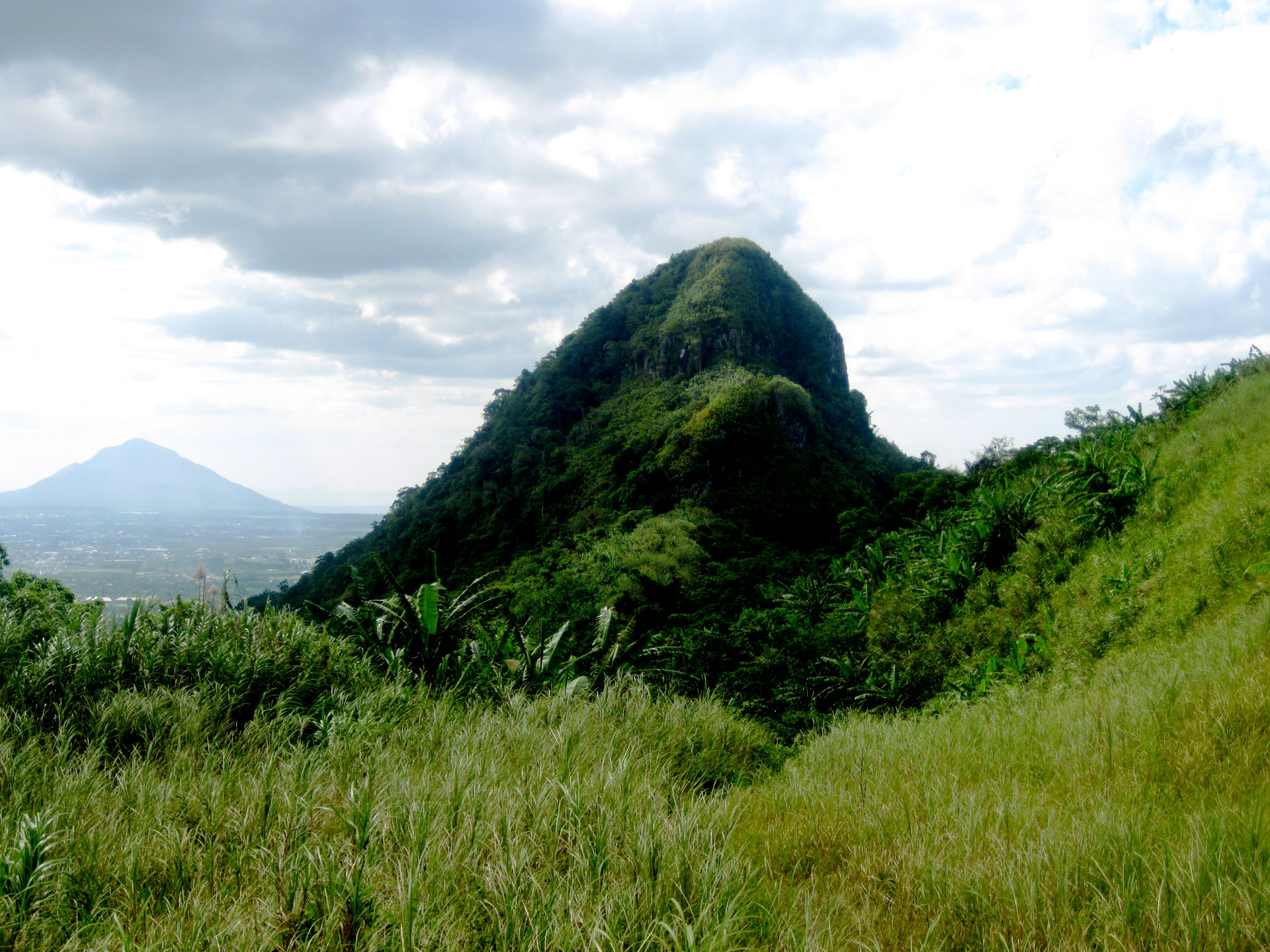 Bagwis Cliff in the Malepunyo Range near Mt. Manabu Campsite