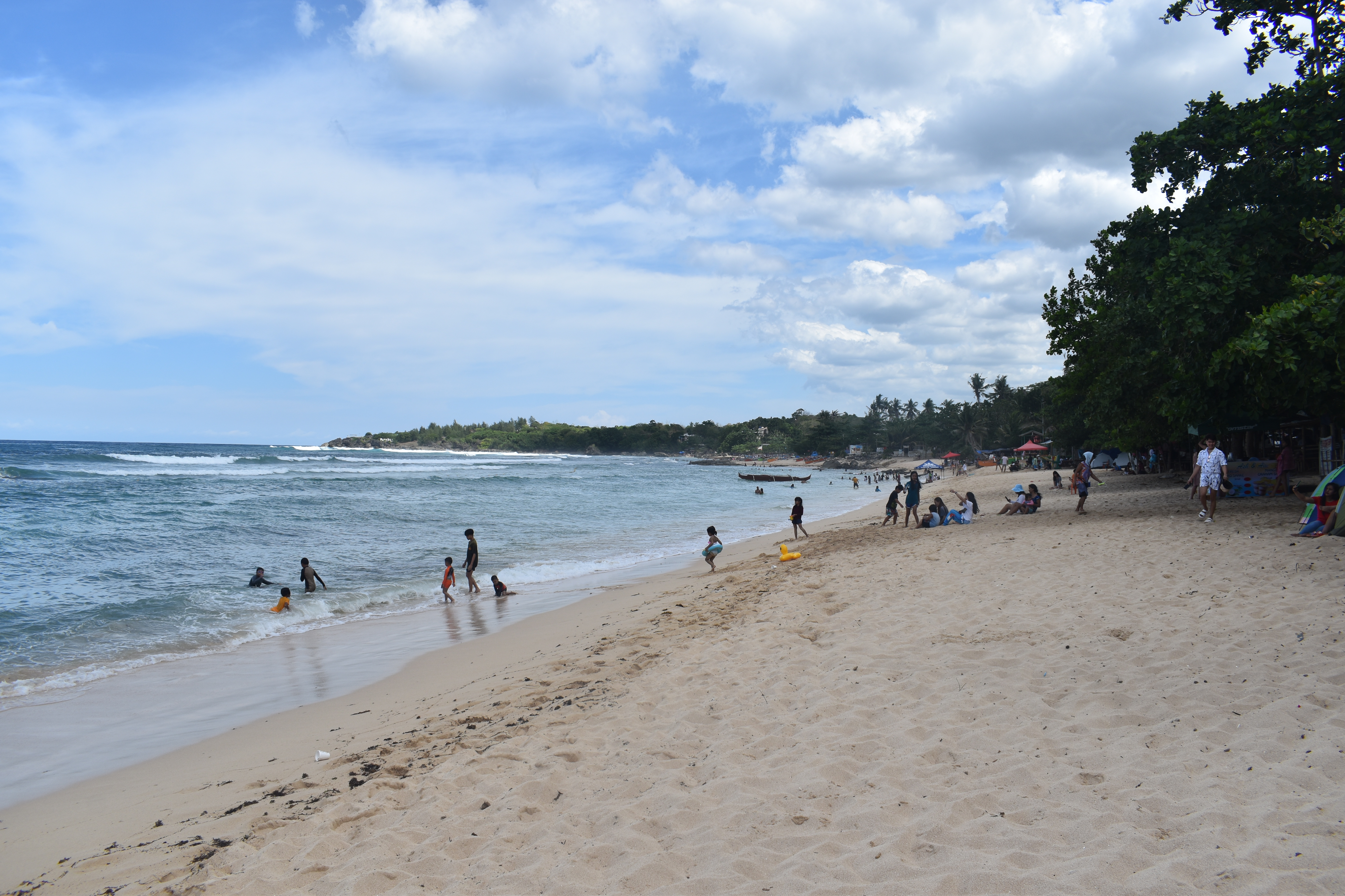 Beachfront sand and cottages near Roven's Place Cabongaoan Beach Camping